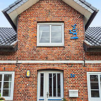 Amrumer Liebhaberstück in Bestlage Norddorf: Freistehendes Friesenhaus mit Charme, Kamin, Meerblick & historischem Kachelzimmer