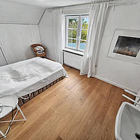 Amrumer Liebhaberstück in Bestlage Norddorf: Freistehendes Friesenhaus mit Charme, Kamin, Meerblick & historischem Kachelzimmer
