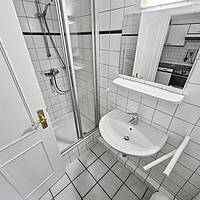 Amrumer Liebhaberstück in Bestlage Norddorf: Freistehendes Friesenhaus mit Charme, Kamin, Meerblick & historischem Kachelzimmer