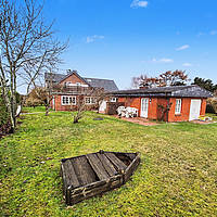Amrumer Liebhaberstück in Bestlage Norddorf: Freistehendes Friesenhaus mit Charme, Kamin, Meerblick & historischem Kachelzimmer
