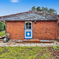 Amrumer Liebhaberstück in Bestlage Norddorf: Freistehendes Friesenhaus mit Charme, Kamin, Meerblick & historischem Kachelzimmer