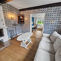 Amrumer Liebhaberstück in Bestlage Norddorf: Freistehendes Friesenhaus mit Charme, Kamin, Meerblick & historischem Kachelzimmer