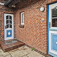 Amrumer Liebhaberstück in Bestlage Norddorf: Freistehendes Friesenhaus mit Charme, Kamin, Meerblick & historischem Kachelzimmer